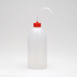 Wash bottles with curved polyethylene straw